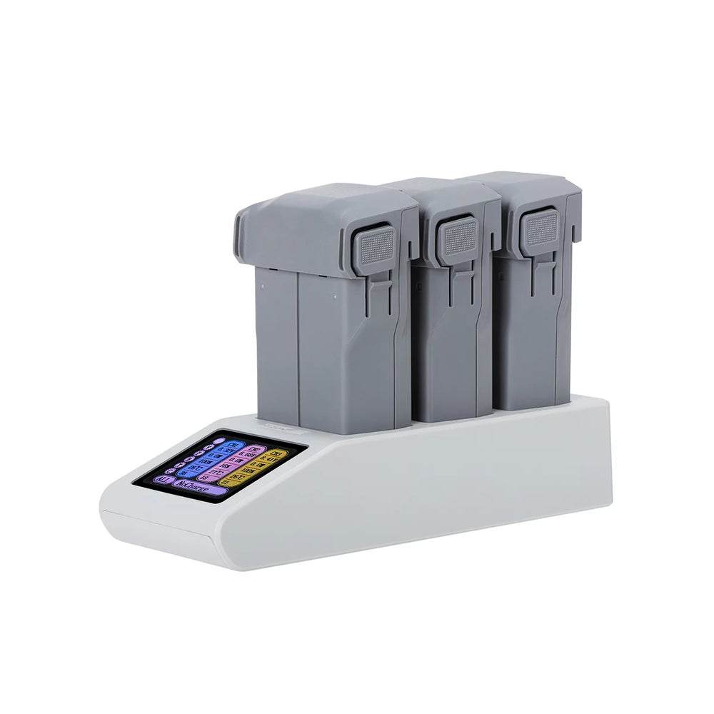Three DJI Mini 5 Pro batteries inserted into the STARTRC sequential charging hub.