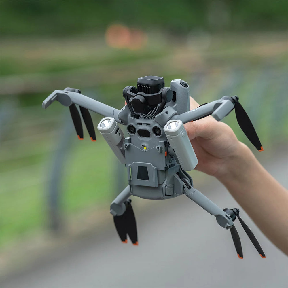 Detailed view showing STARTRC light bracket not obstructing Mini 5 Pro avoidance sensors.