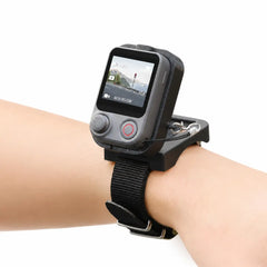 AeroFocus DJI Osmo Pocket 4P FrameTap remote wrist mount worn on the wrist