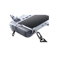Close up view of aluminum balance strap mount installed on DJI RC Pro controller