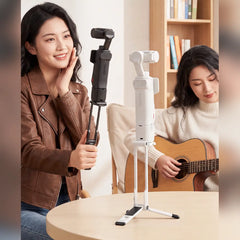 AeroFocus magnetic foldable tripod used as a desktop stand for Insta360 Luna Ultra