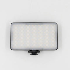 Front view of rectangular RGB LED camera fill light with compact portable design