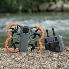 DJI Avata 360 drone with the high visibility orange bumper installed.
