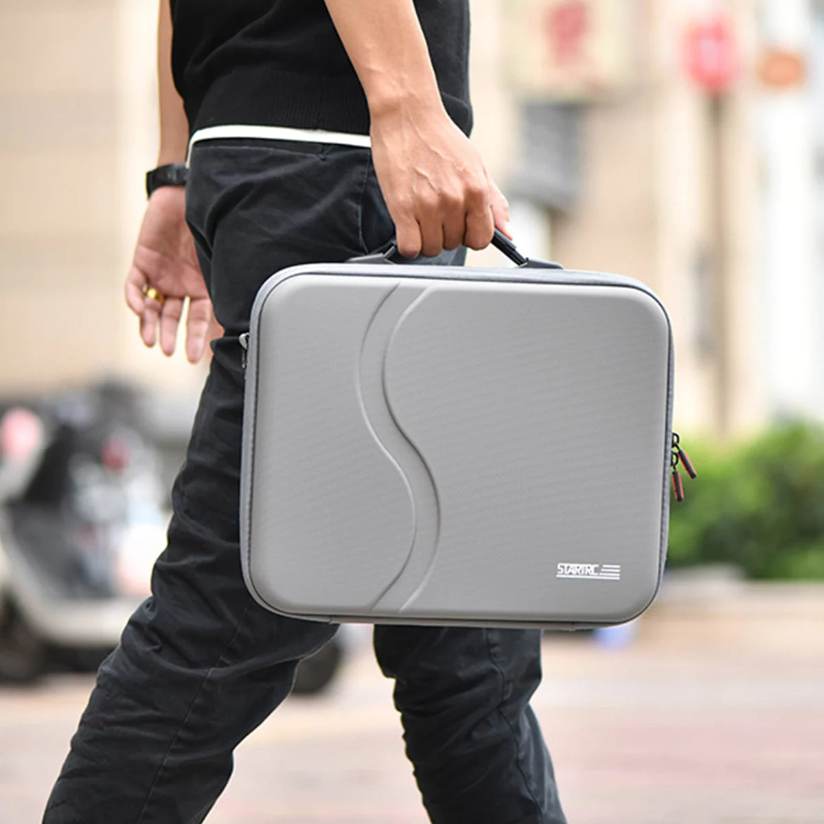 Portable retractable handle detail of STARTRC DJI Neo 2 case.