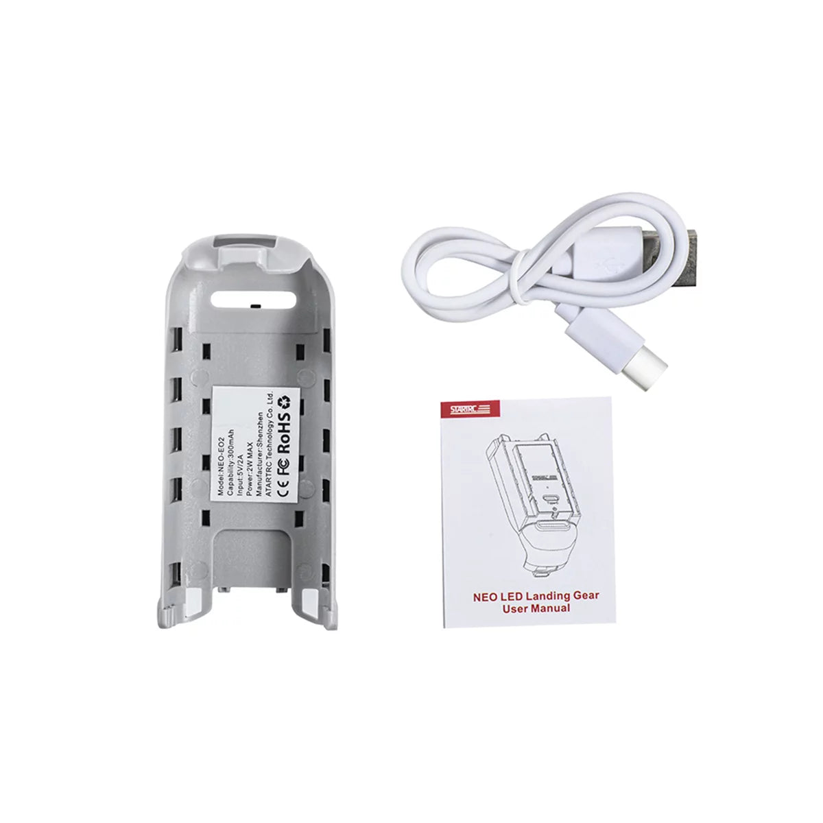 Package contents of DJI Neo night flight kit including landing gear, cable, and manual.