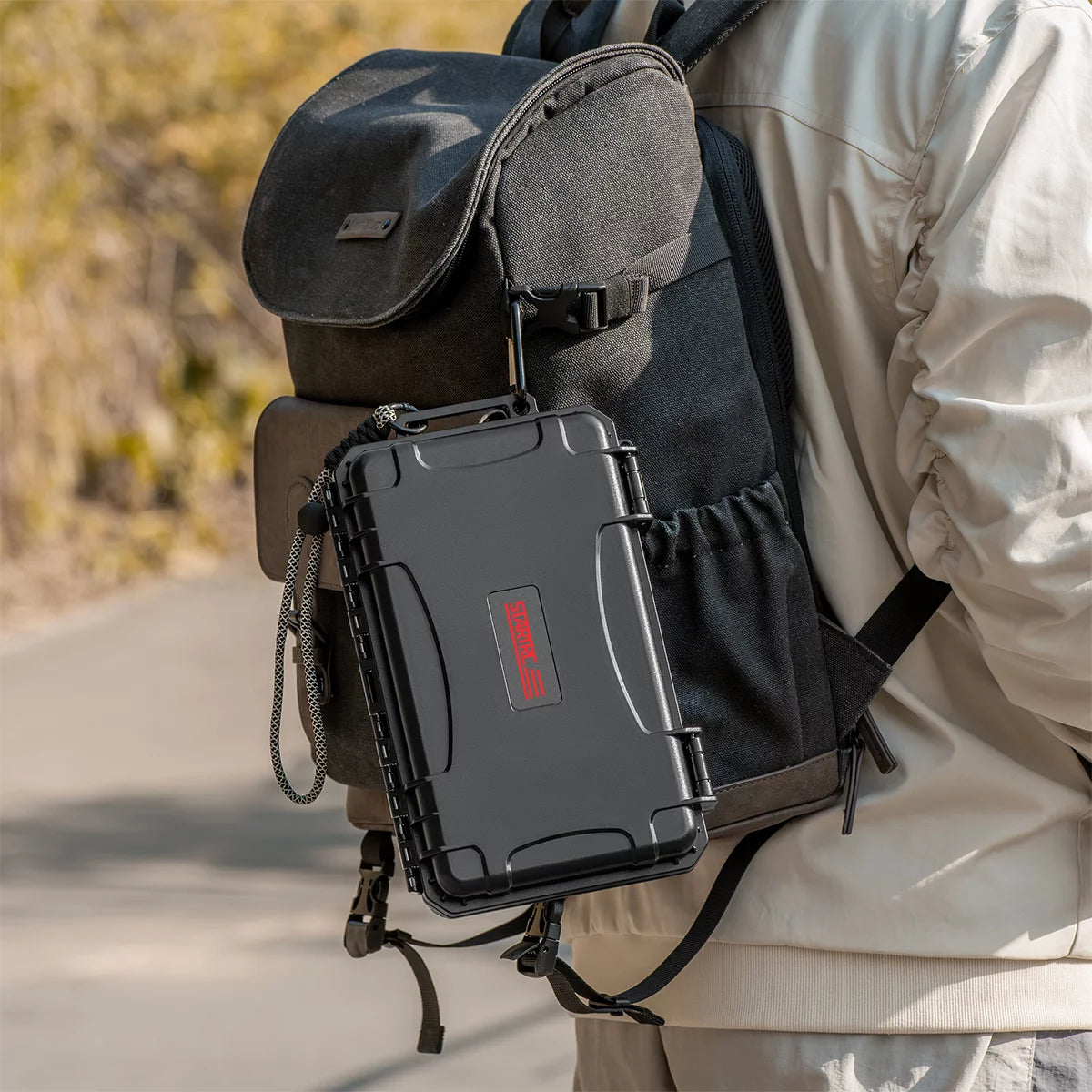 High-density secure latch and carabiner detail on the rugged travel case.