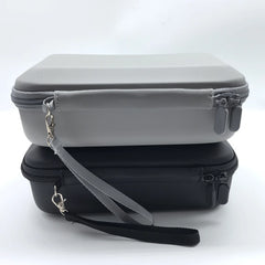 Durable hand strap and portable lanyard detail for DJI Pocket 4 case.