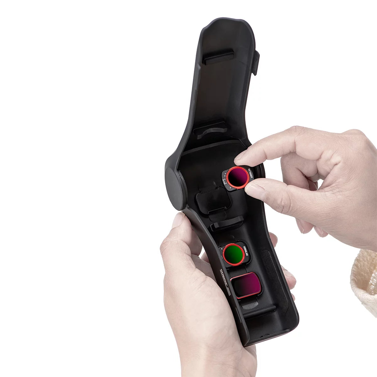 Magnetic filter compartment holding 3 ND filters inside the Pocket 4 case.