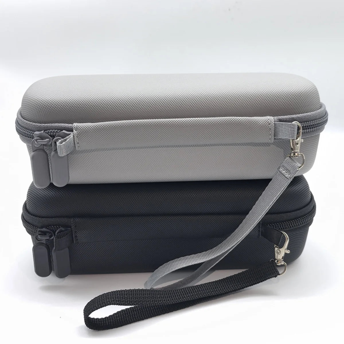 Portable hand strap and lanyard detail for minimalist DJI Pocket 4 case.