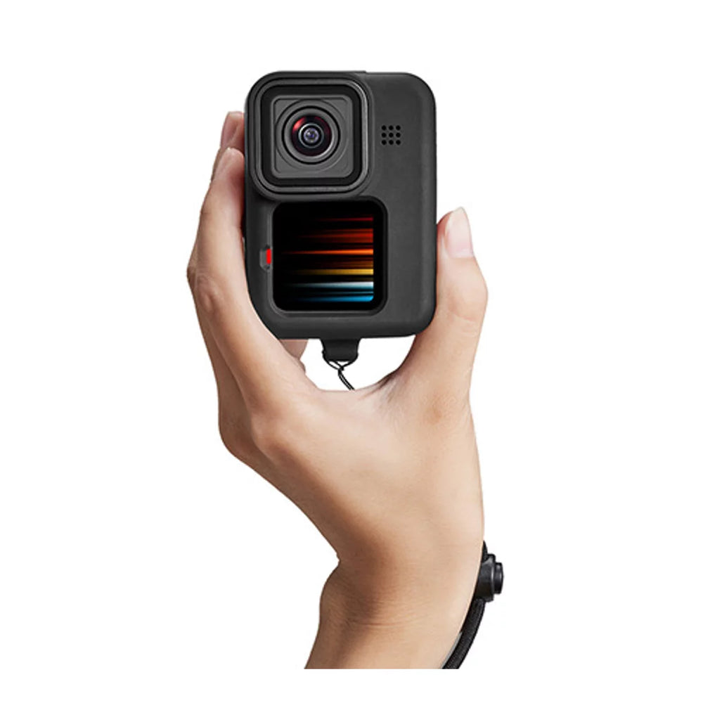 Durable adjustable hand strap for secure GoPro carrying during outdoor adventures.