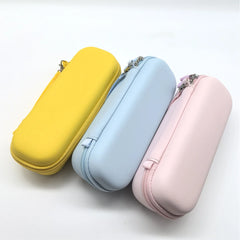 Group display of pink, blue, and yellow DJI Pocket 4 bags for retailers.