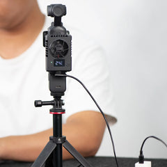 DJI Pocket 4 cooler being powered via external USB-C power source.