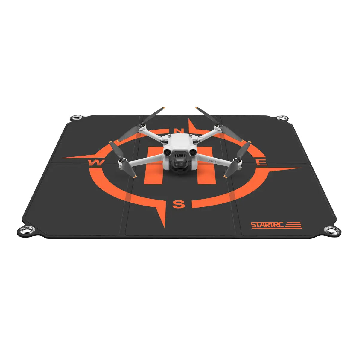 STARTRC 55cm foldable landing pad with a consumer drone positioned for takeoff