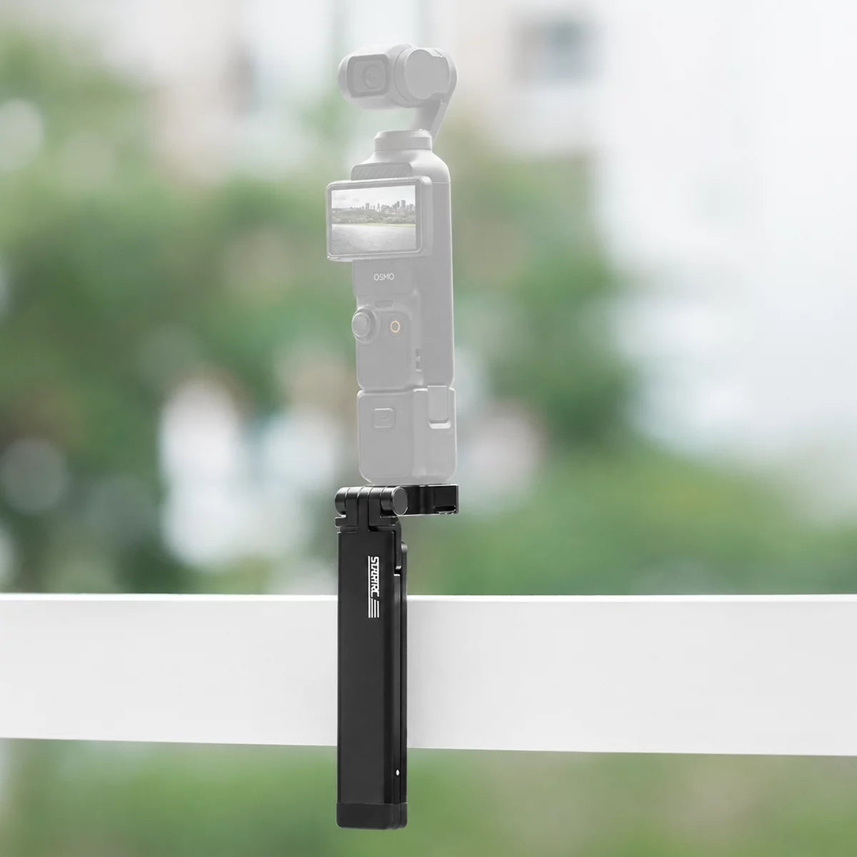 magnetic mount function of STARTRC magnetic mini tripod on white background